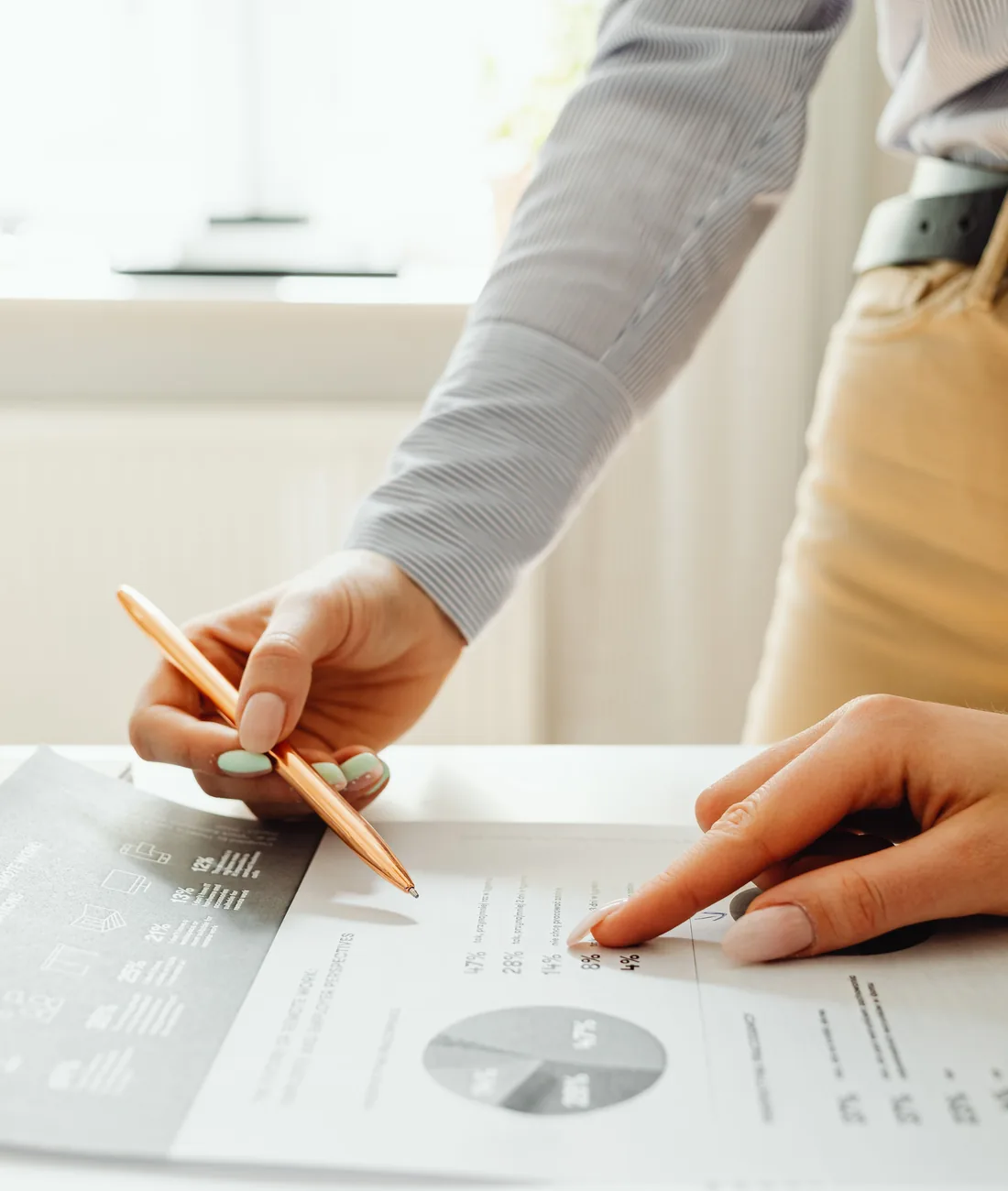Consultant reviewing a business report